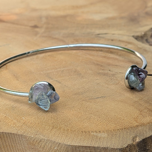 Close-up of two raw fluorite crystals in stainless steel bezels cuff bracelet – EL-Creations