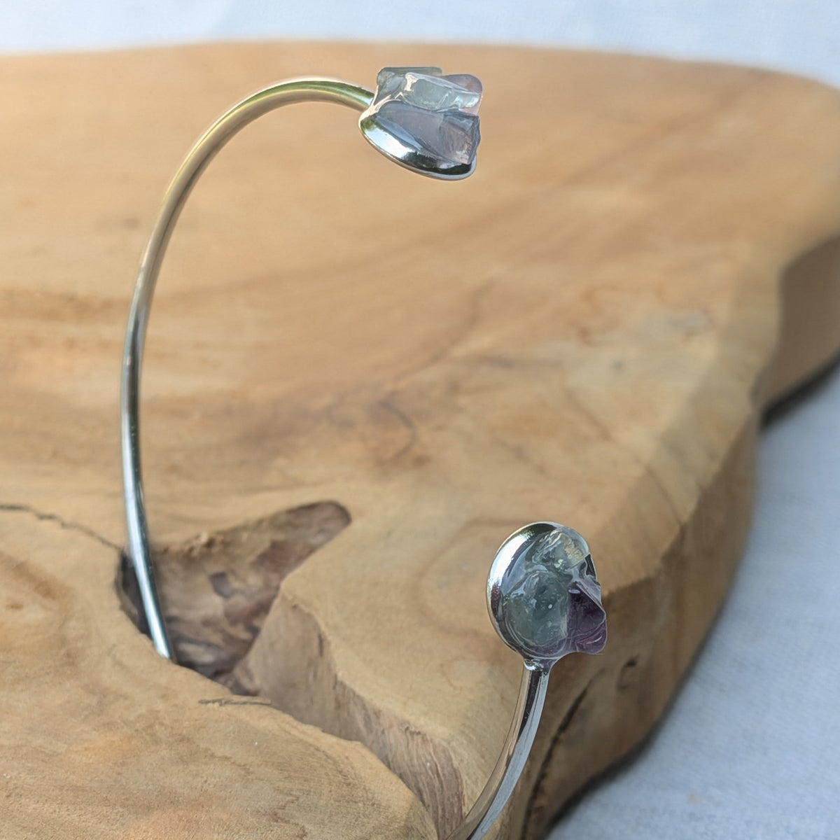 Collection of handmade crystal cuff bracelets fluorite amethyst moonstone amber on wood – EL-Creations