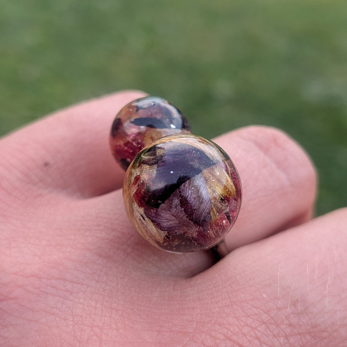Tulip petal resin double sphere adjustable ring worn on hand close-up outdoor – EL-Creations