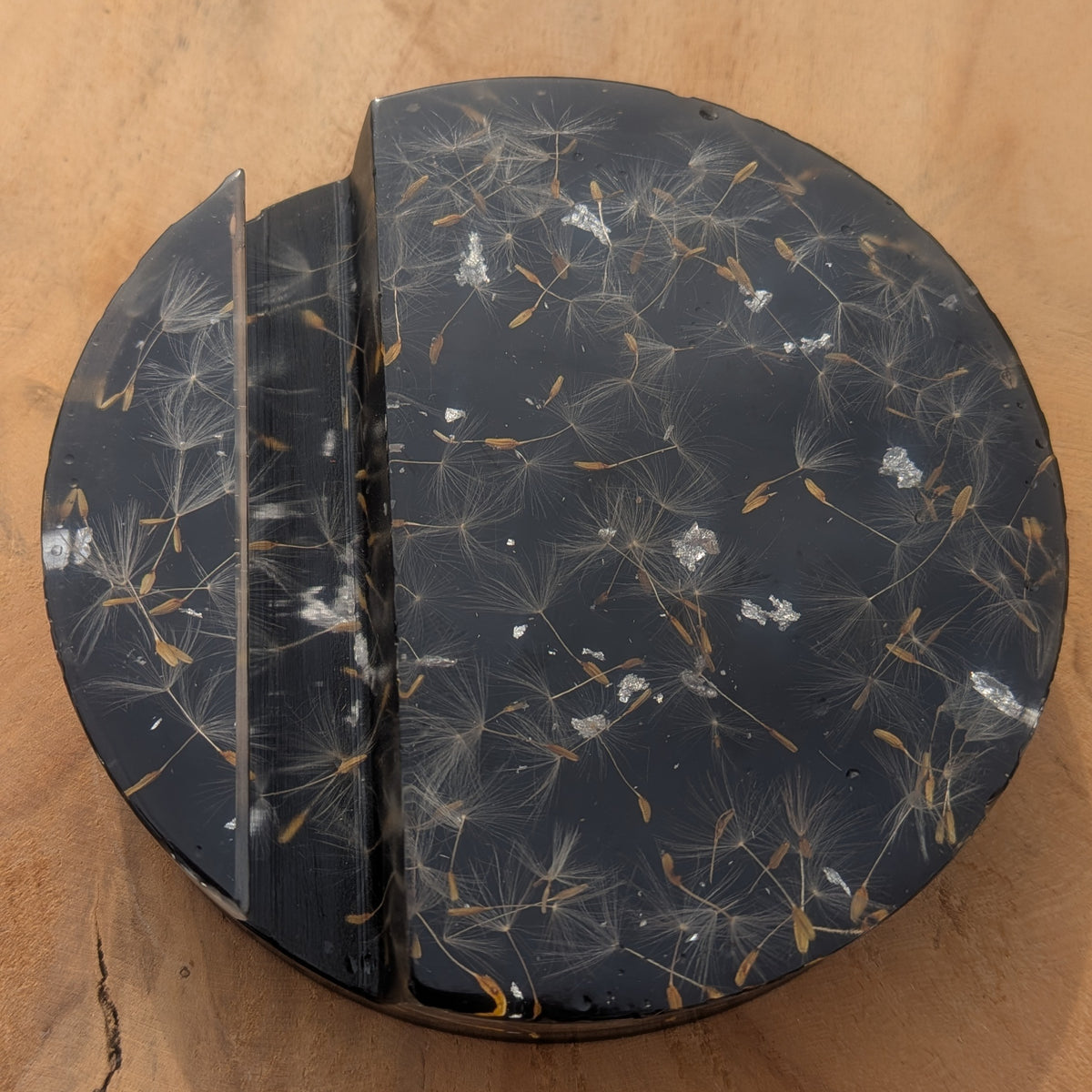 Close-up of black resin phone stand with real dandelion and silver flakes – cottagecore gift idea – EL-CreationS