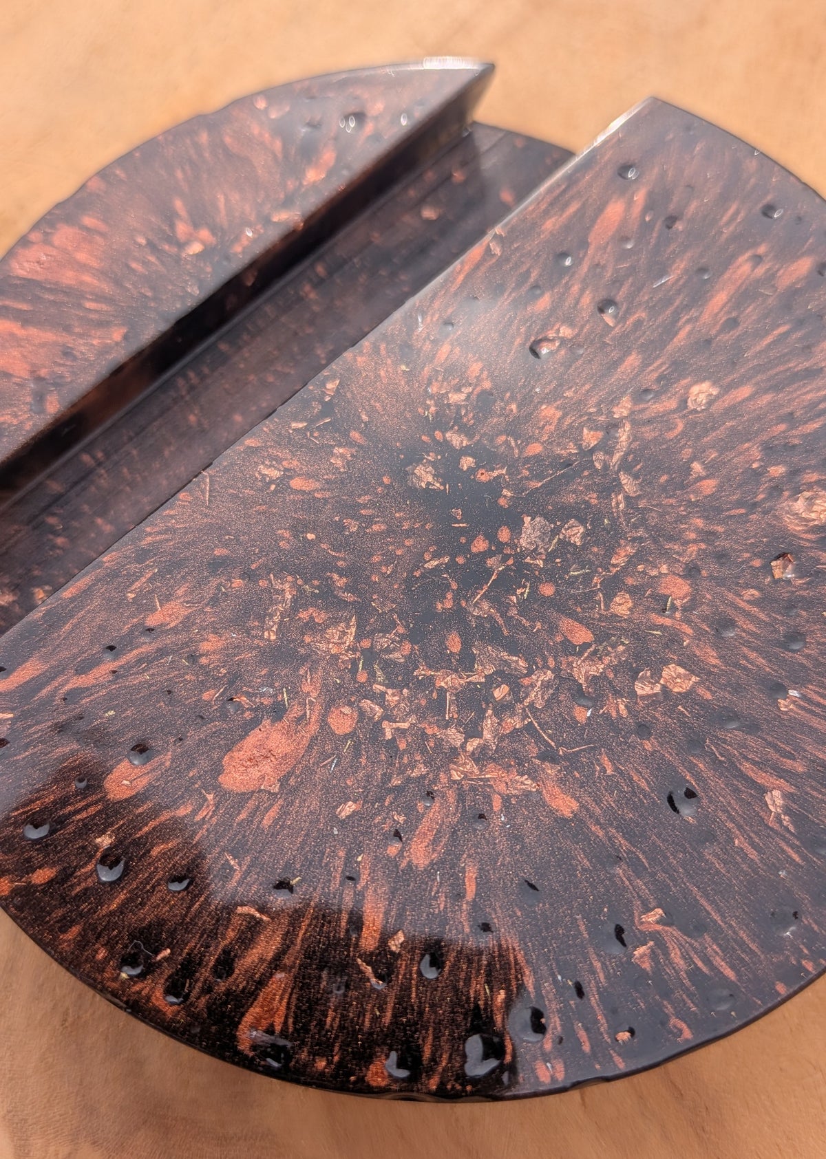 Angled view of black resin phone stand with copper shimmer – gothic industrial desk gift – EL-CreationS