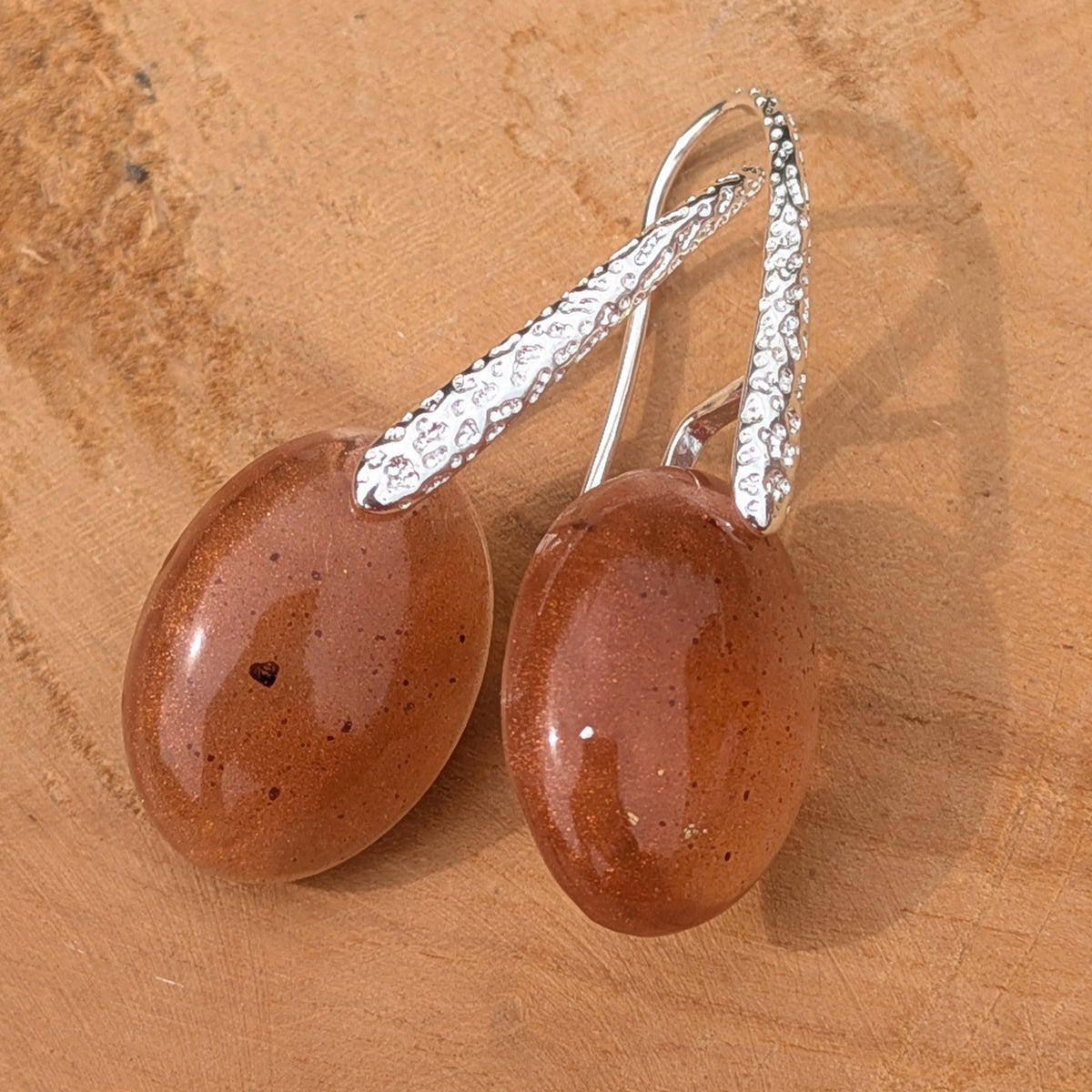 Delicate oval resin drop earrings in warm brown with silver hooks back view showing clasp detail – EL-Creations