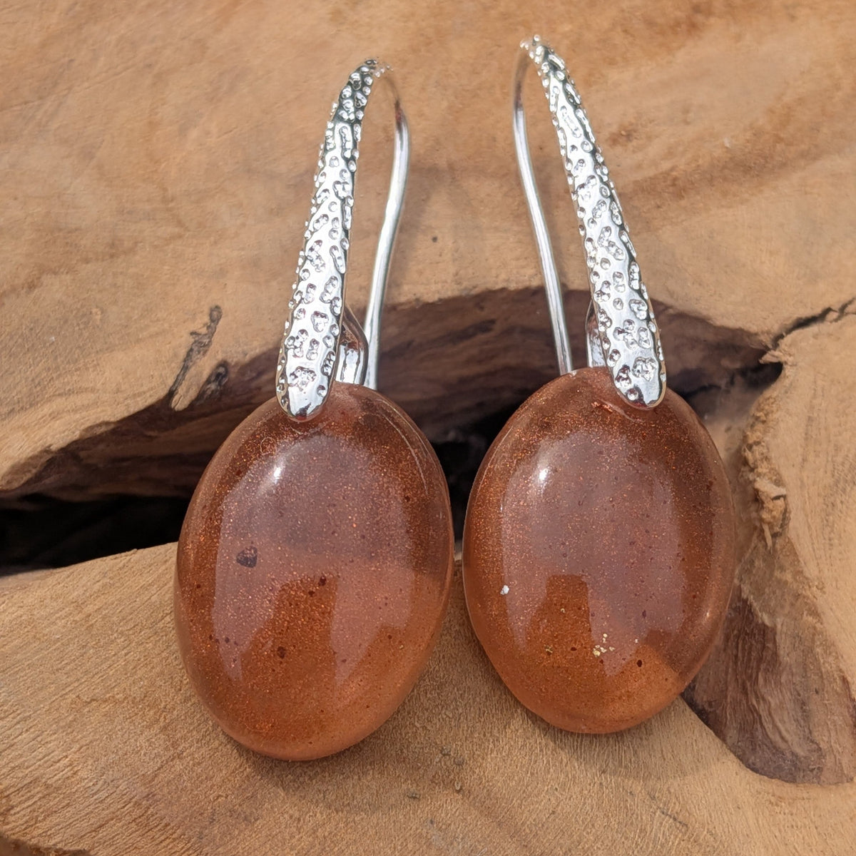 Lightweight oval resin earrings brown copper flakes 36mm total length on driftwood side view – EL-Creations