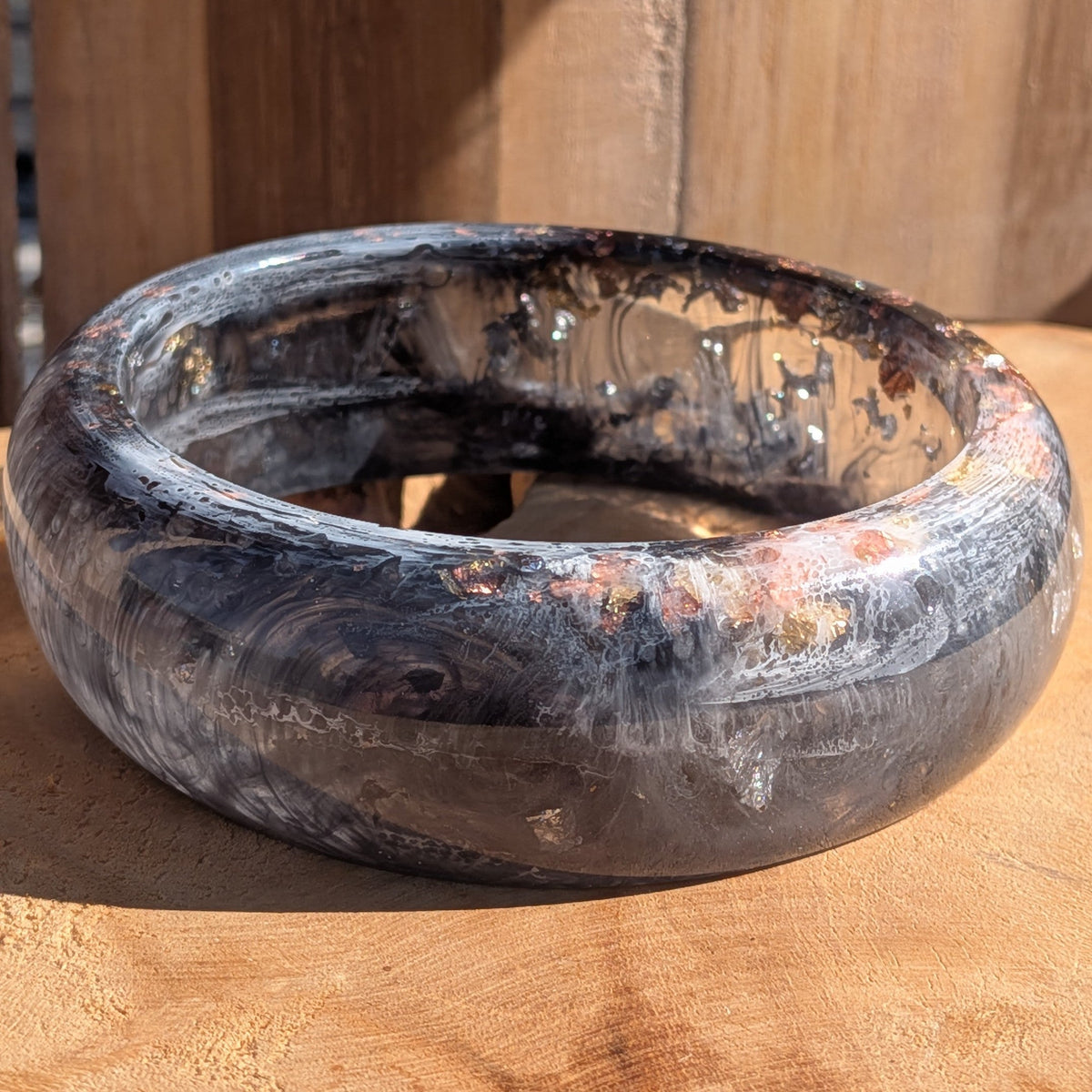 Chunky dome resin bangle black white pigment worn on wrist side profile showing bold sculptural shape – EL-Creations