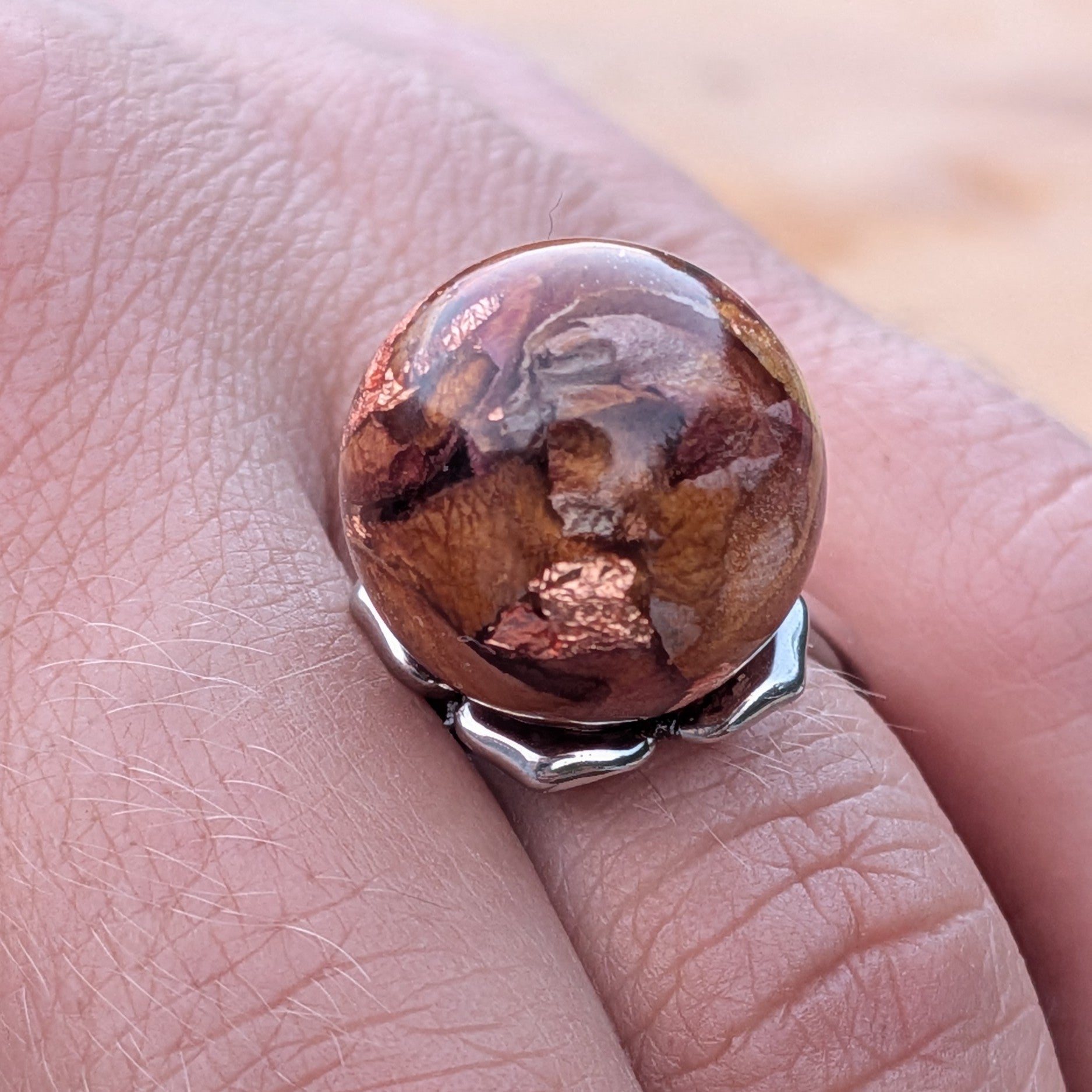Rose petals and copper flakes resin ring on wooden surface – silver adjustable band – EL-Creations