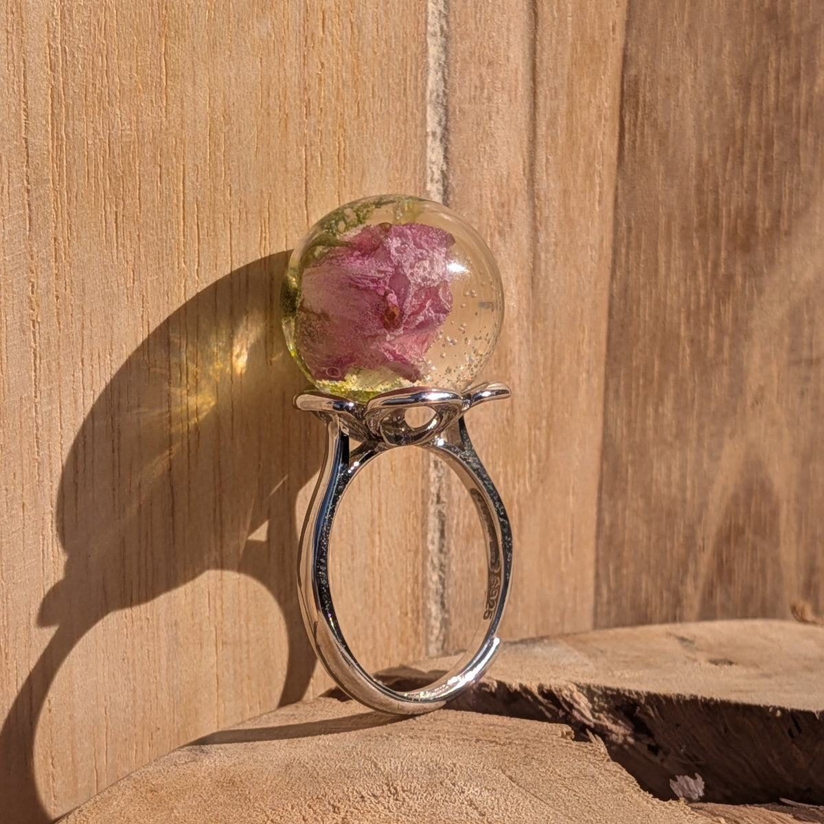 Handmade adjustable resin ring with dried pink rose and green moss – EL-Creations