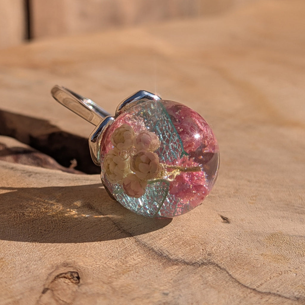 Resin sphere ring with baby's breath and skeleton leaf on silver band – side view – EL-Creations