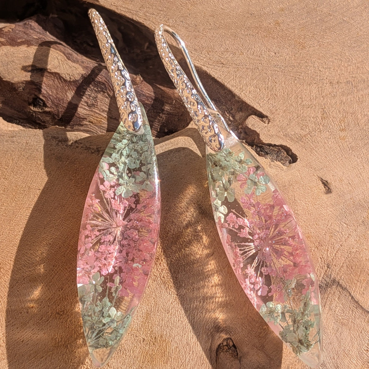 Botanical drop earrings worn – delicate pink flower resin jewelry – EL-Creations