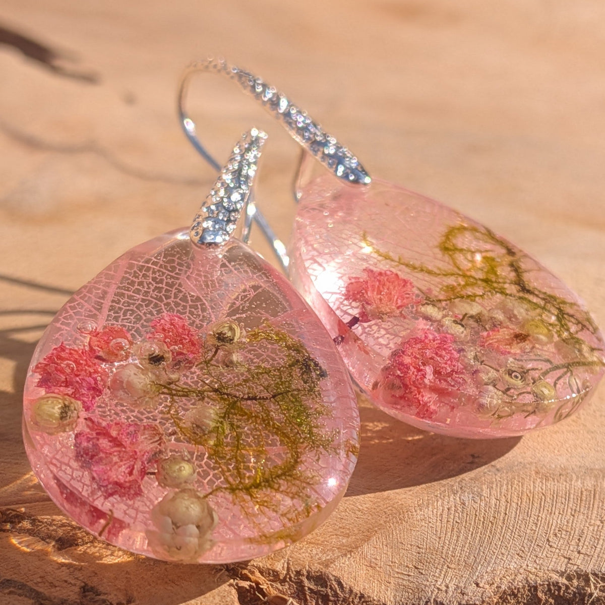 Handmade pink resin earrings with skeleton leaf, moss and dried flowers on crystal hooks – EL-Creations