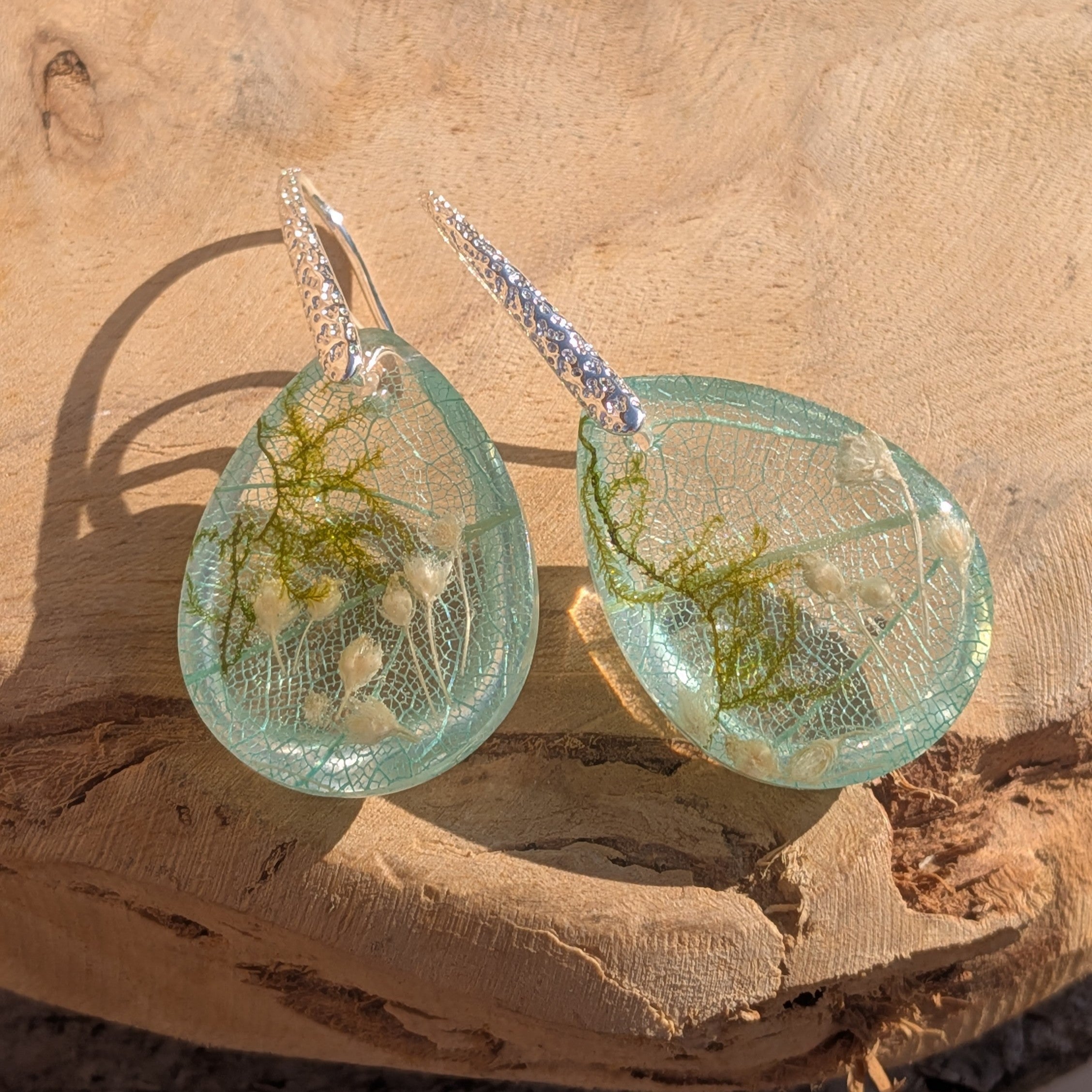 Skeleton leaf resin earrings aqua mint pair on wood in natural light silver filigree hooks – EL-Creations