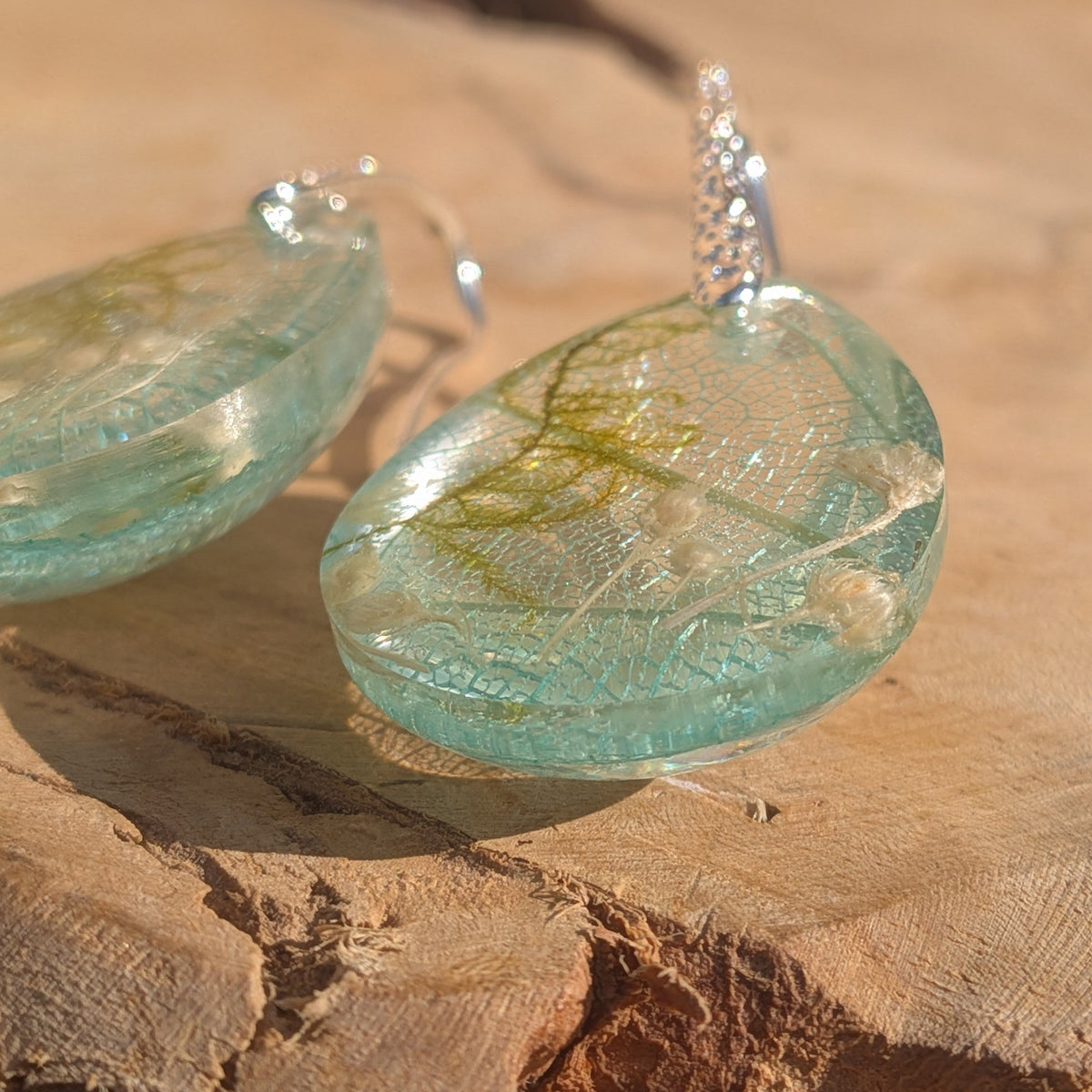 Skeleton leaf resin earrings macro close-up aqua resin lace texture moss and wildflowers detail – EL-Creations