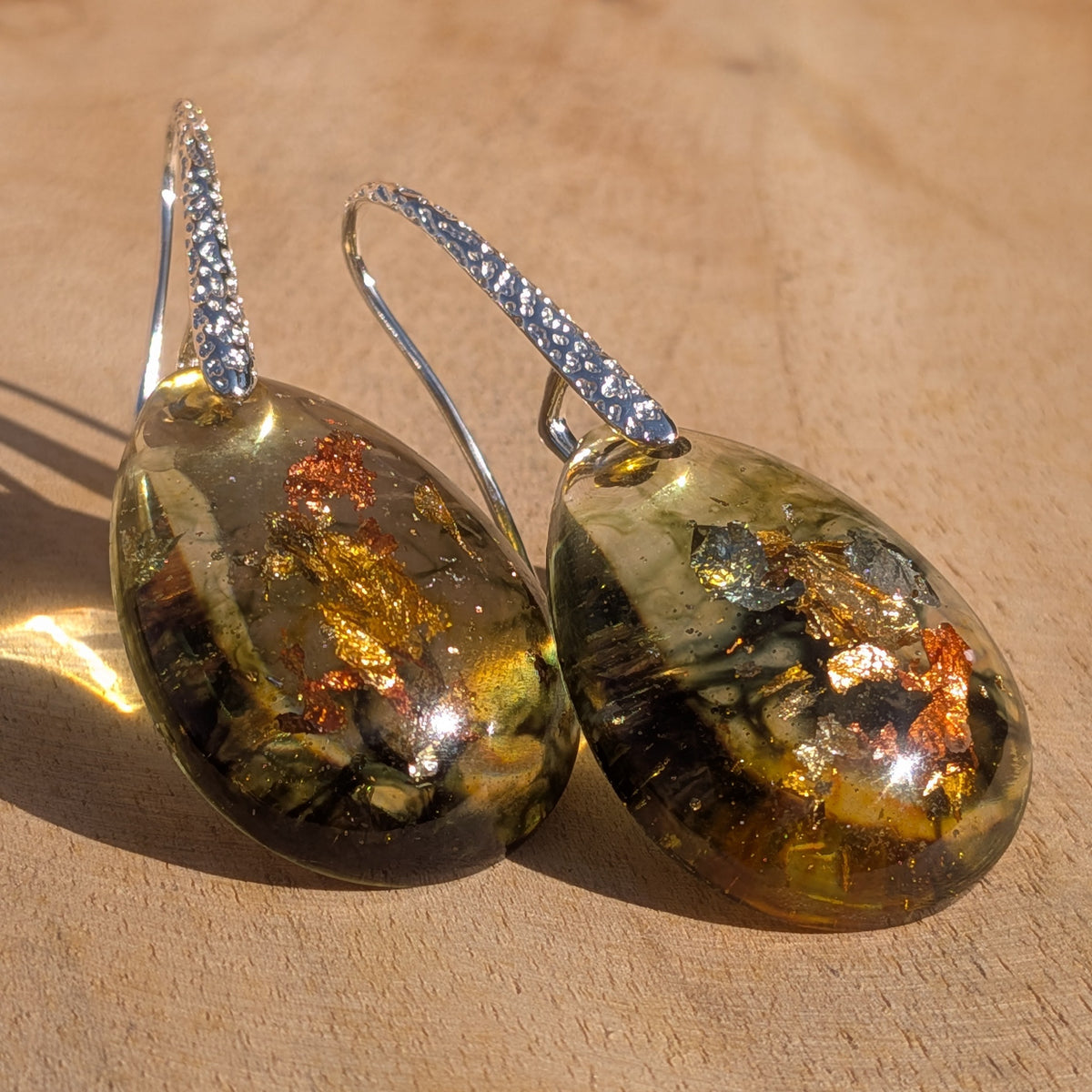 Olive green and amber resin teardrop earrings with metallic flakes and silver hooks, EL-Creations