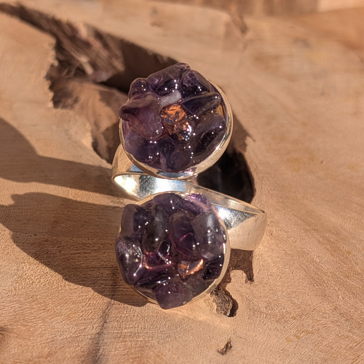 Angled view of the adjustable amethyst ring with two 14 mm decorative settings, EL-Creations