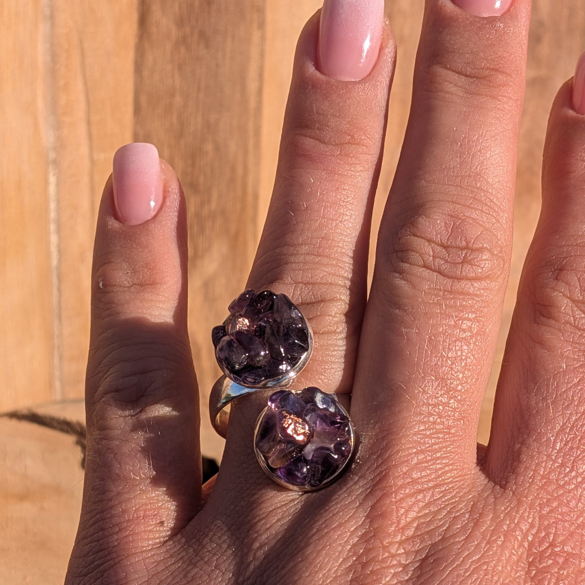 Adjustable purple amethyst statement ring shown on a hand for scale, EL-Creations
