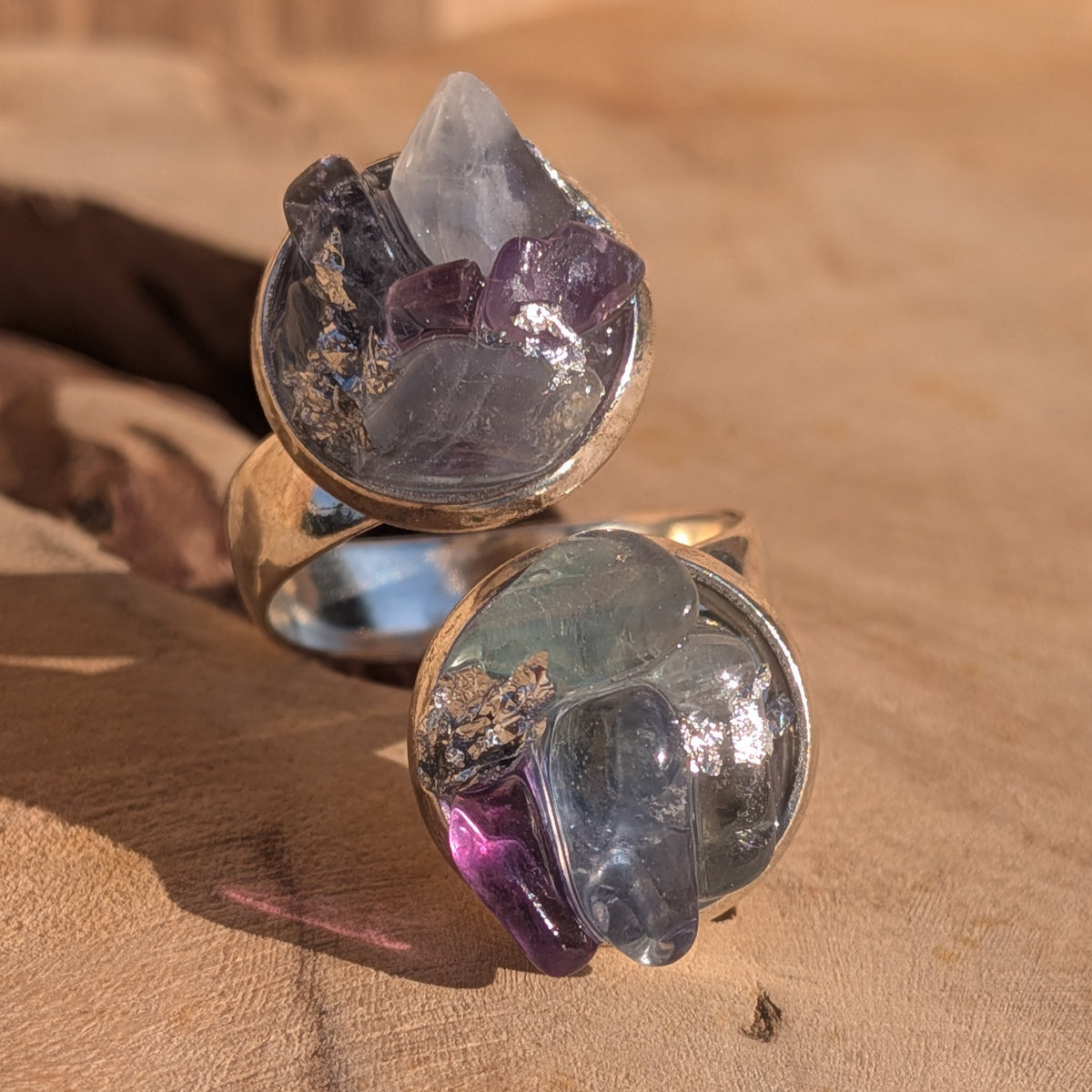 Front close-up of the fluorite ring showing purple and pale green stones with silver flakes, EL-Creations
