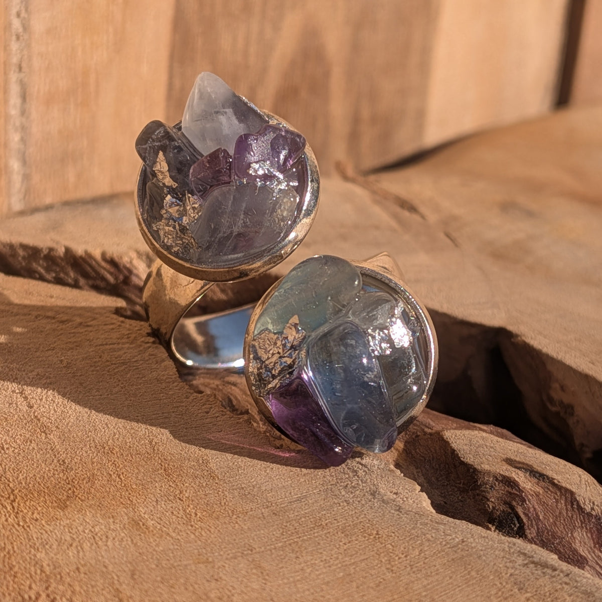 Angled view of the fluorite ring with two round 14 mm decorative settings, EL-Creations