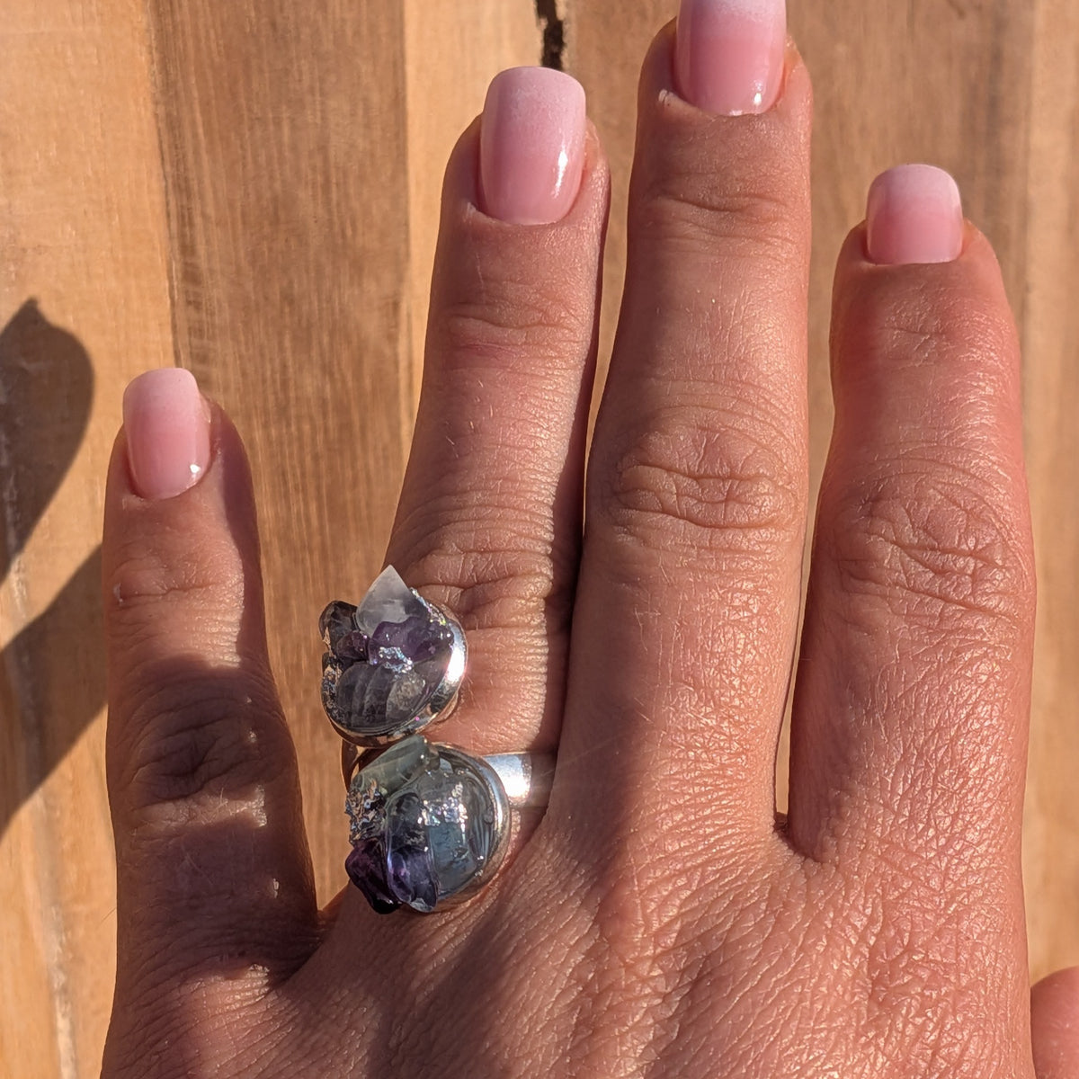 Low side view of the fluorite double cluster ring worn on a finger, EL-Creations