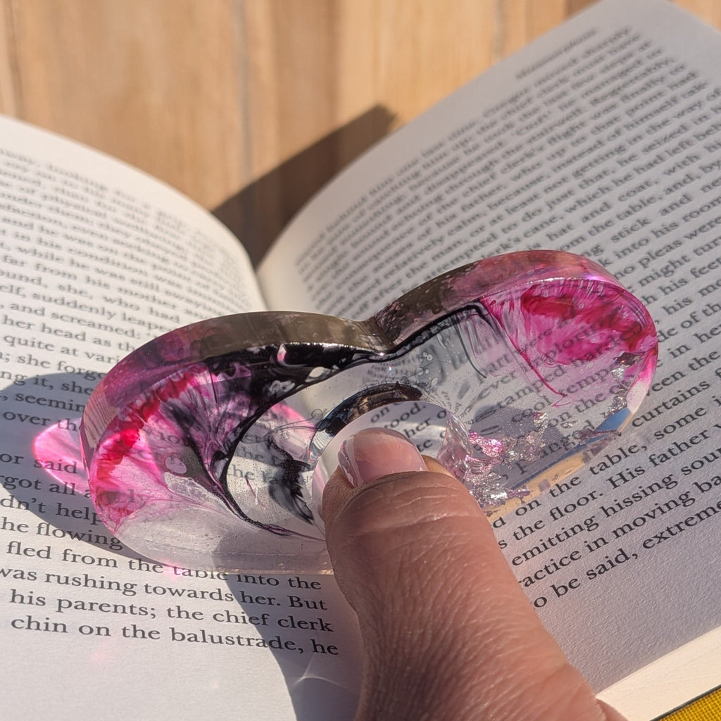 Oversized resin book ring with silver flakes – side view showing sculptural form – EL-Creations