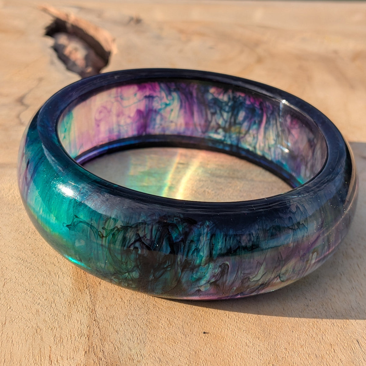 Galaxy resin bangle bracelet worn on wrist outdoor – EL-Creations
