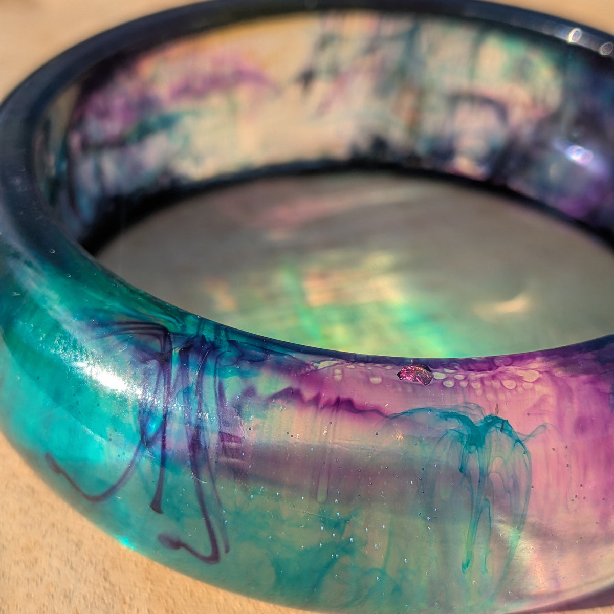 Wide resin bangle with teal interior and galaxy swirl pattern – EL-Creations