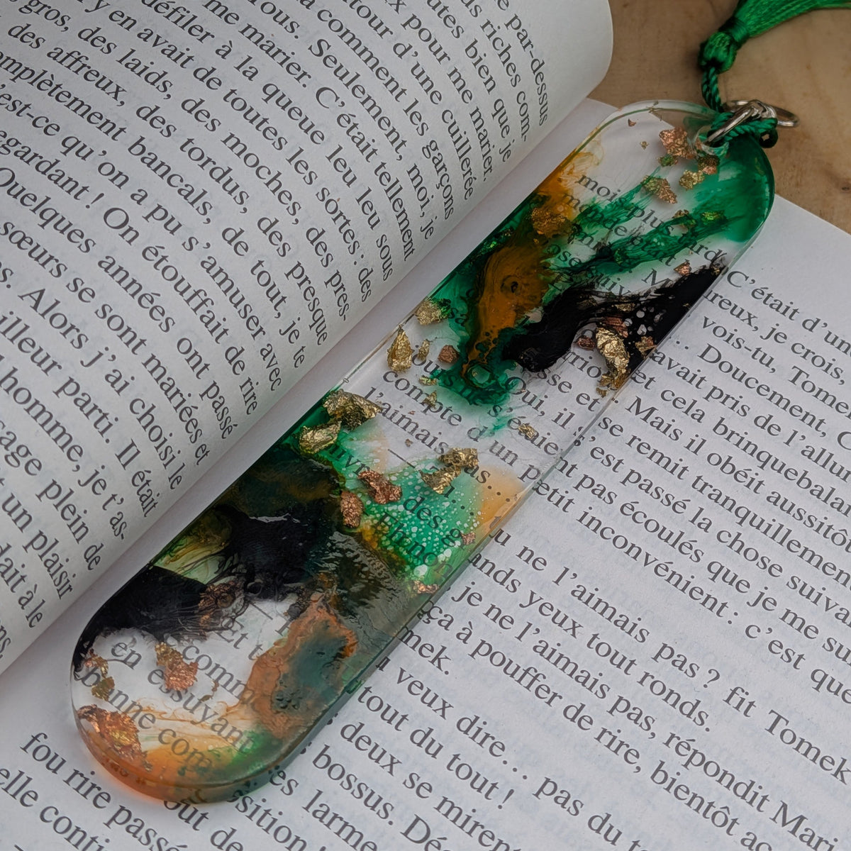 Close-up macro of emerald green and copper gold leaf resin bookmark – EL-Creations