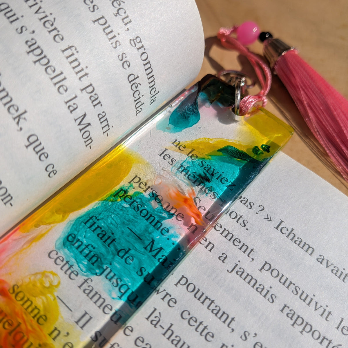 Close-up of teal and yellow resin bookmark top with pink lobster clasp and bead – EL-Creations