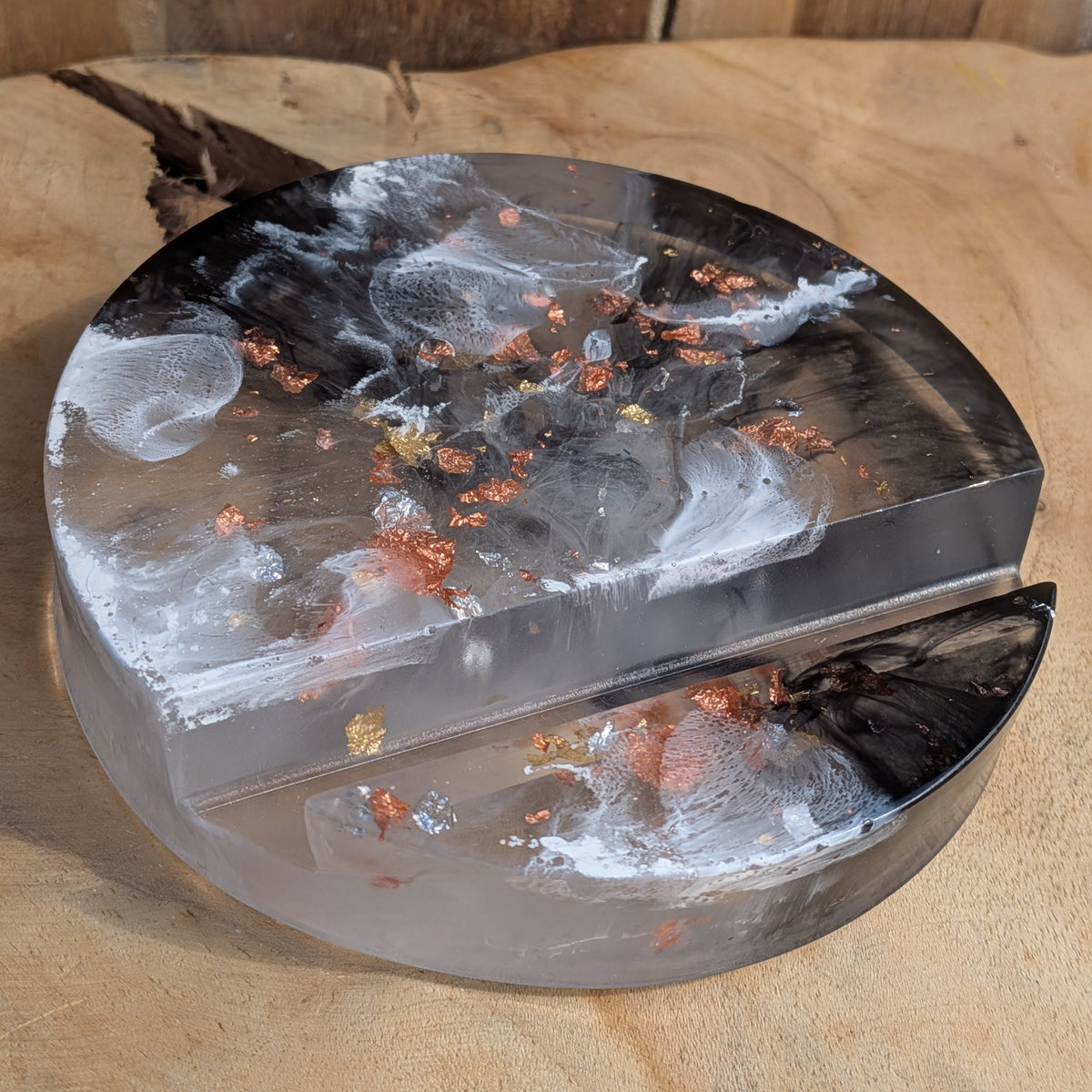 Side view of round epoxy resin phone holder with metallic flakes - EL-Creations