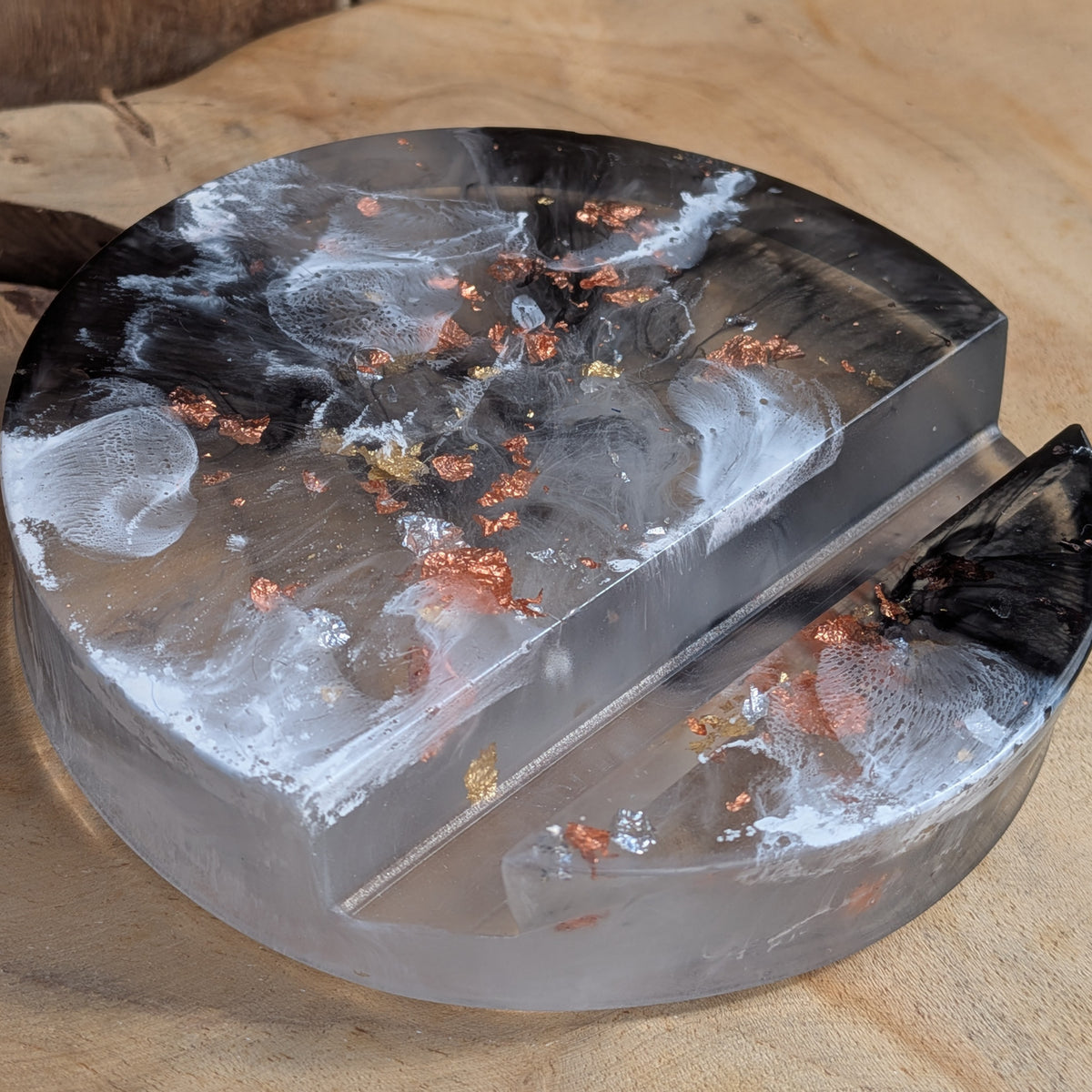 Round black marble resin phone stand with a smooth glossy finish - EL-Creations