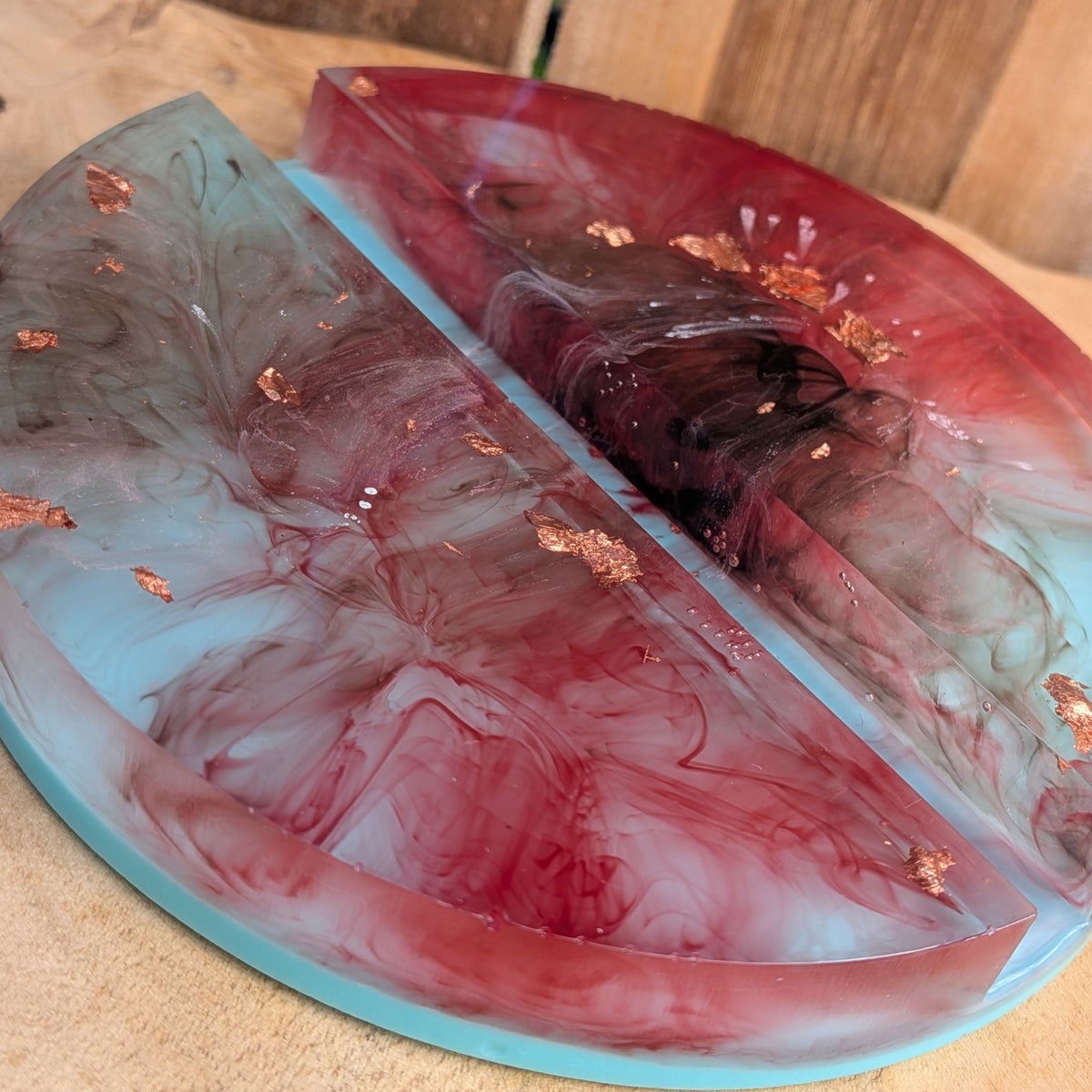 Close-up of burgundy resin swirls with copper metallic flakes - EL-Creations