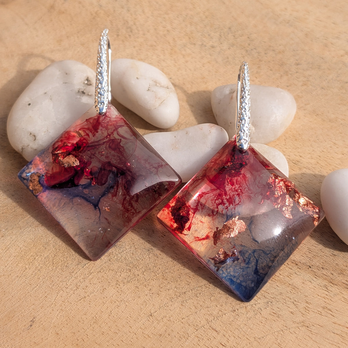 Pair of glossy red and blue square resin earrings arranged with white stones, EL-Creations

