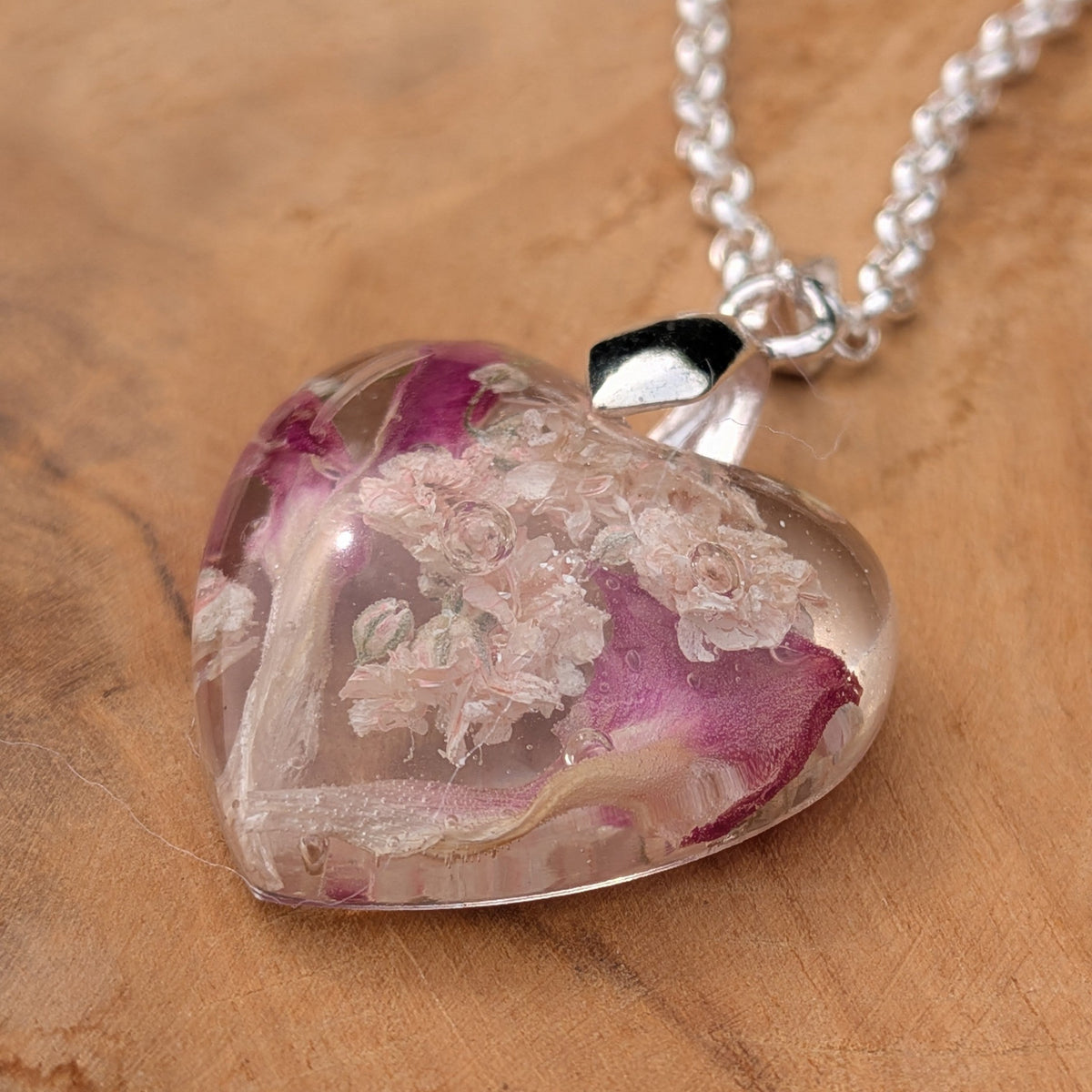 Clear heart resin pendant with white baby's breath and carnation petals by EL-Creations