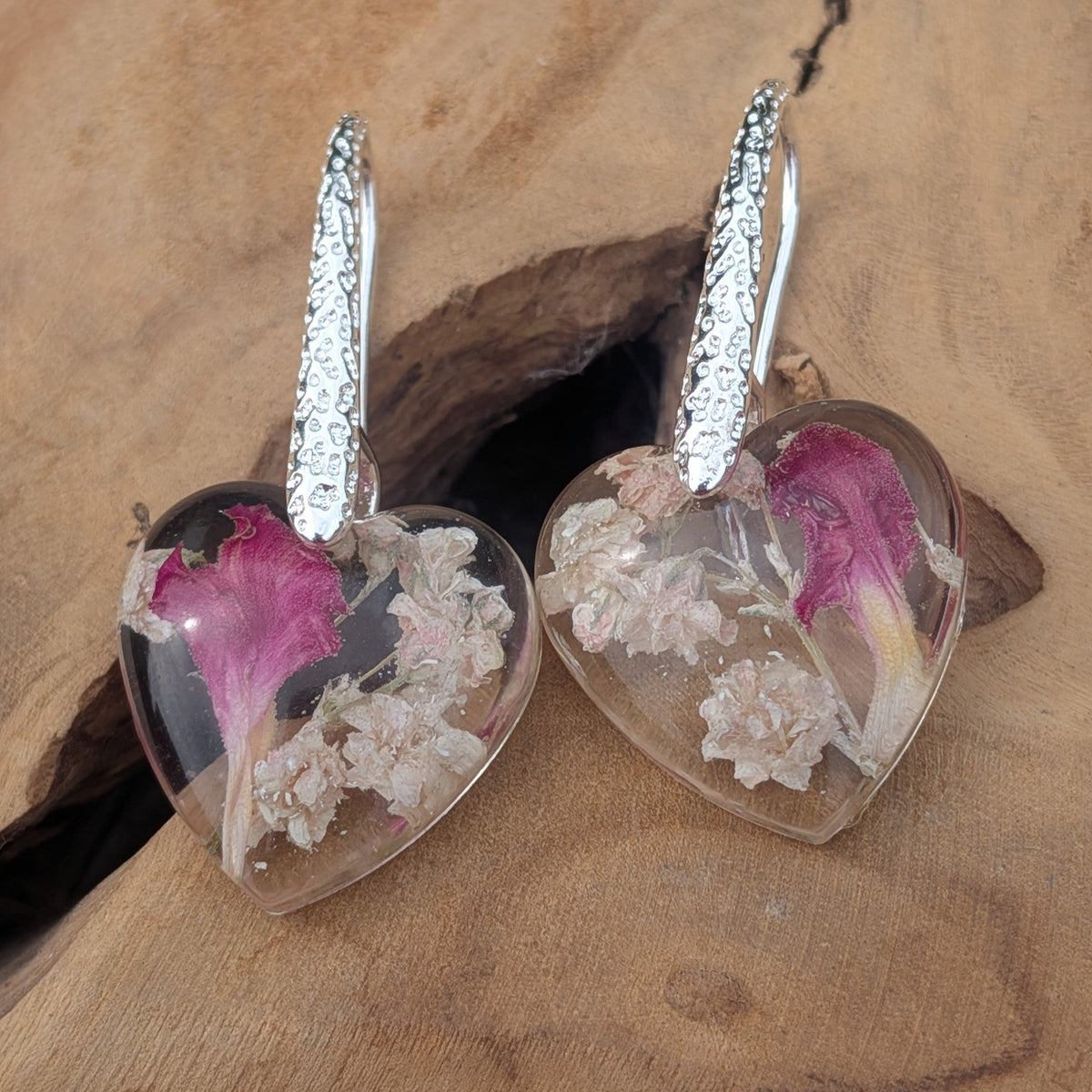 Handmade heart resin earrings with pink carnation on textured silver wires by EL-Creations