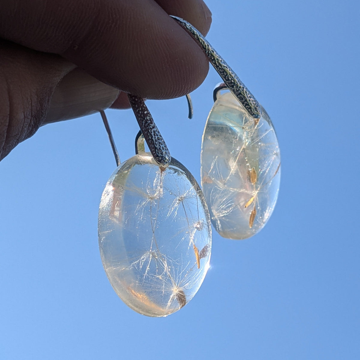 Handmade botanical dandelion earrings with real wish seeds in clear resin by EL-Creations