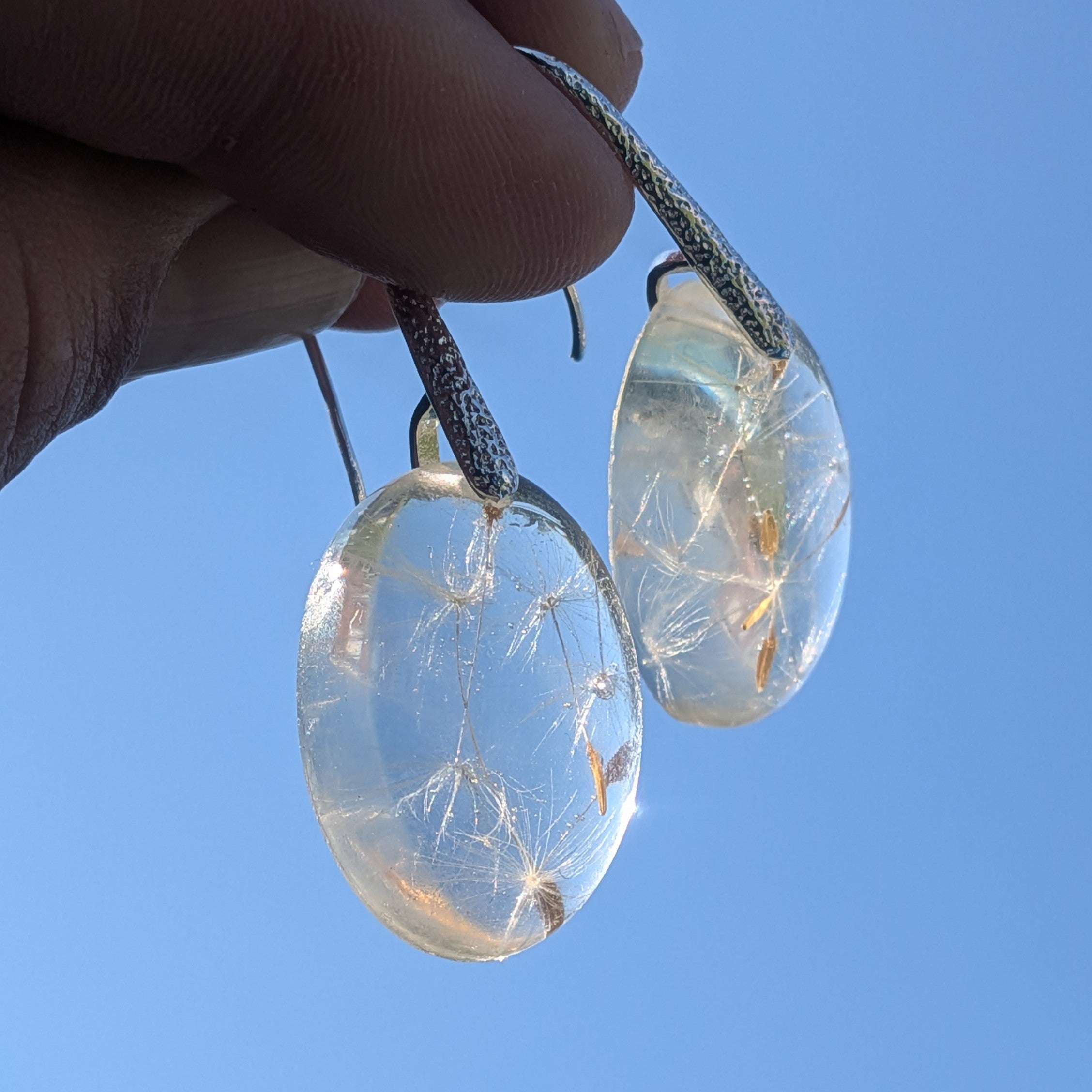 Handmade botanical dandelion earrings with real wish seeds in clear resin by EL-Creations