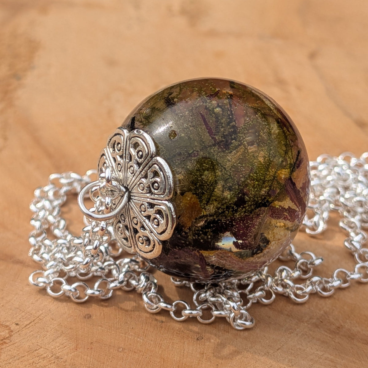 Moss and tulip resin ball necklace with decorative silver flower cap by EL-Creations