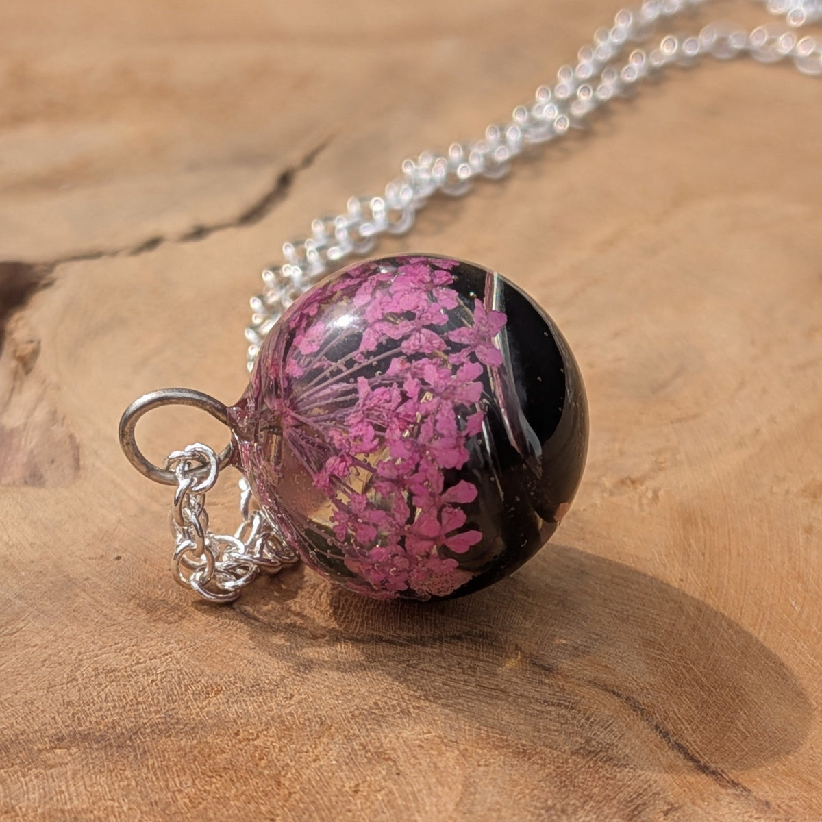 Real pink flower resin sphere necklace with black backdrop on sterling silver chain by EL-Creations